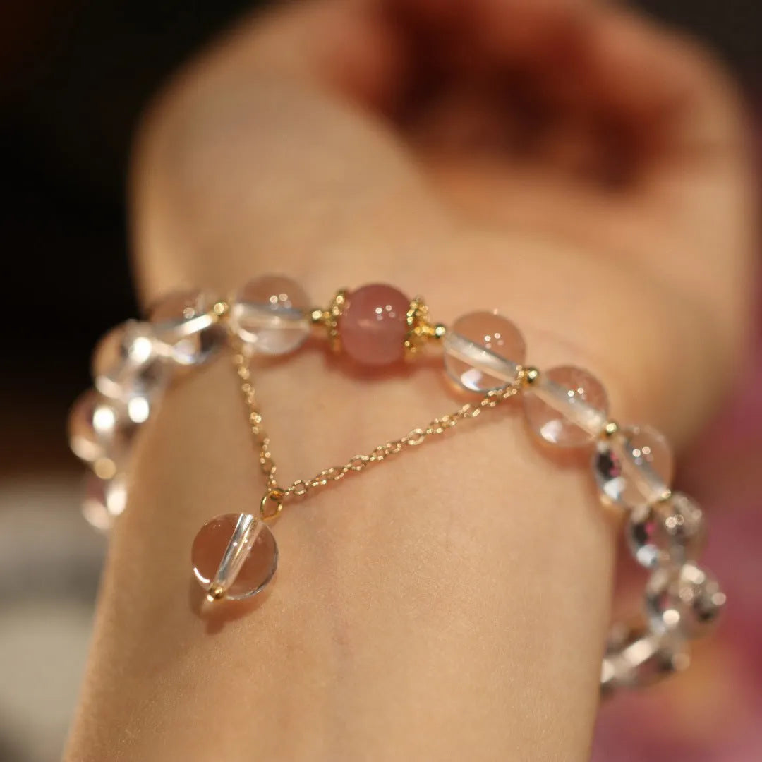 Chinese style geometric crystal bracelet with cat eye obsidian effect and auspicious patterns.