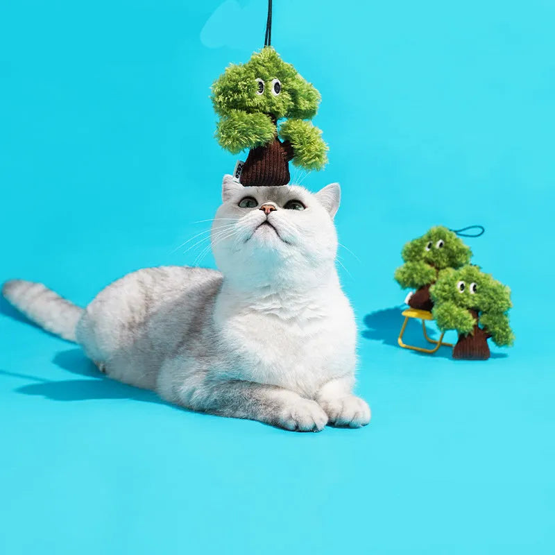 Pine tree shaped fabric cat mint toy with dangling tease stick in three size options