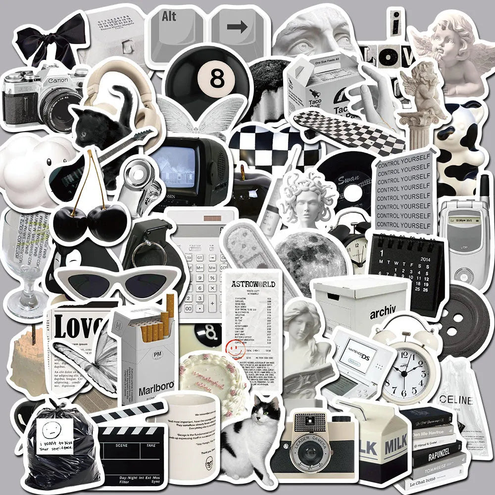 Assortment of black and white vinyl stickers featuring coffee cups and abstract designs for laptops and phones.