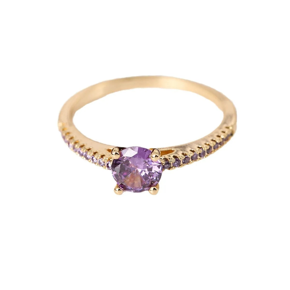 Geometric hexagonal copper ring with colourful zircon stones on a grey background.