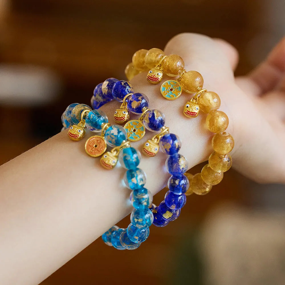Handmade national style swallow gold beast bracelet in colourful fragrant grey gold foil coloured glaze glass