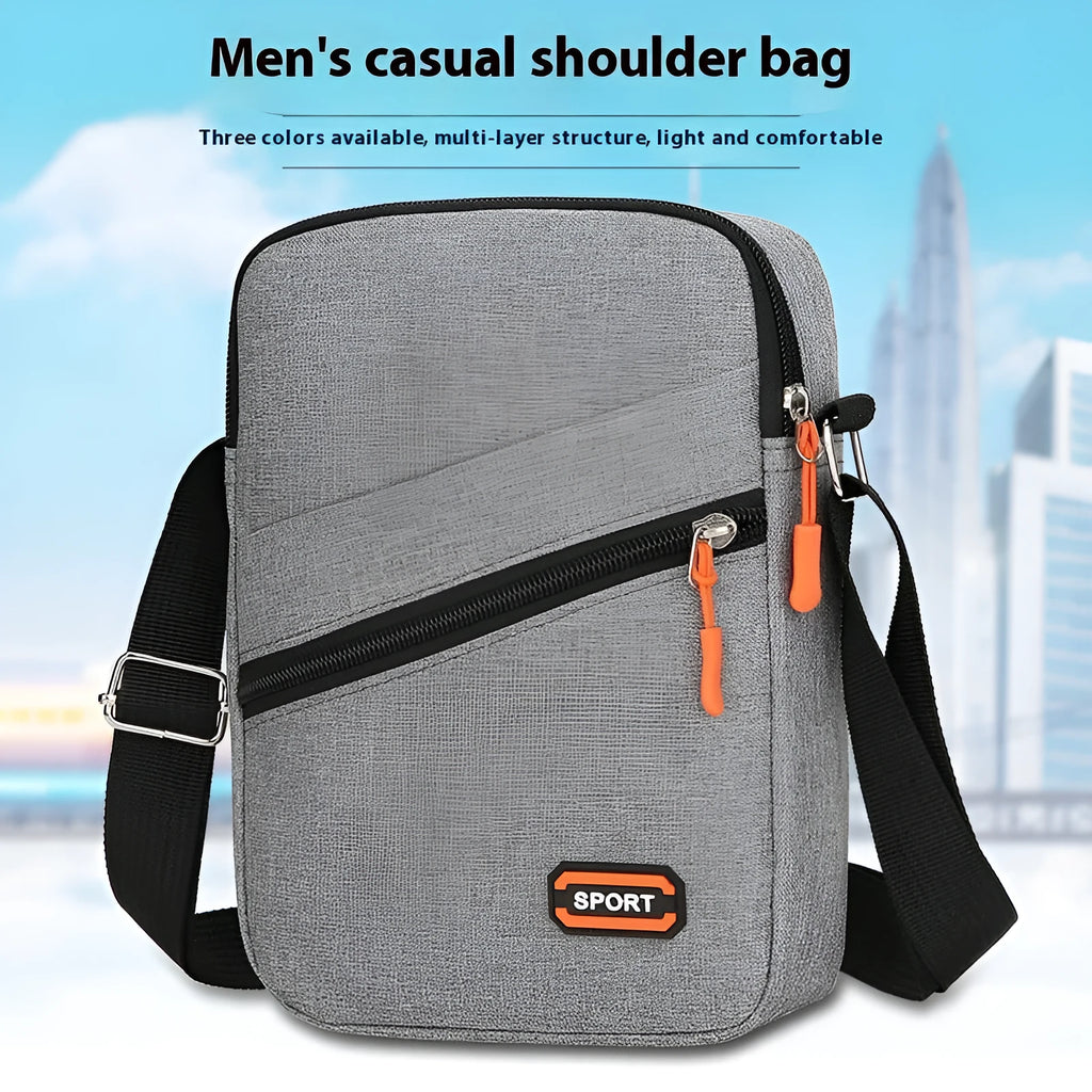 Solid colour Oxford cloth commuter bag with contrast detailing and crossbody shoulder strap
