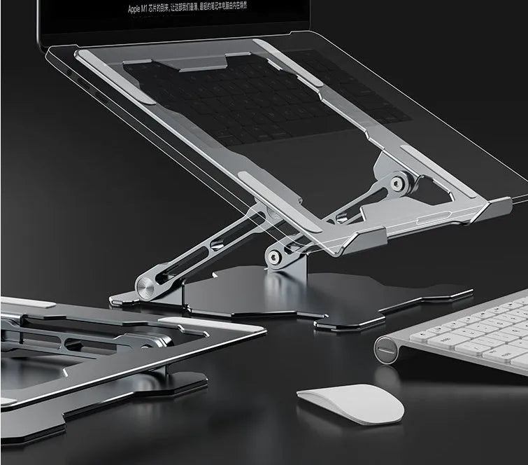 Grey aluminium adjustable laptop stand in folded position showing hollow design and silicone pads