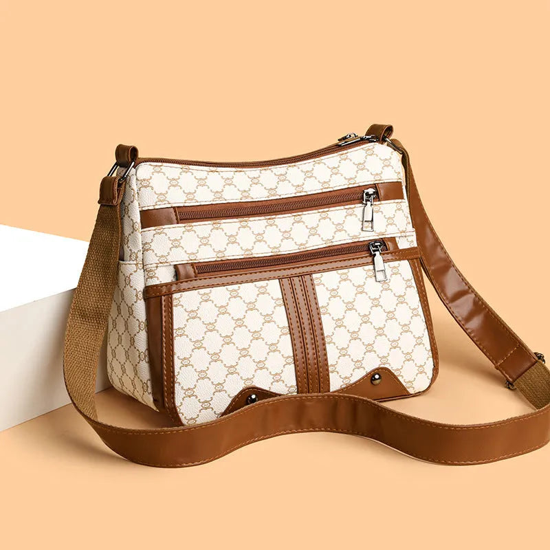 Brown women's crossbody bag with stitching pattern design and adjustable strap