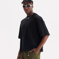 Men's loose fit pure cotton t-shirt in apricot colour on a hanger, showing short sleeves and casual style.