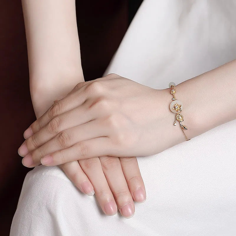 Hetian jade lotus peace buckle bracelet in 925 silver with antique retro design