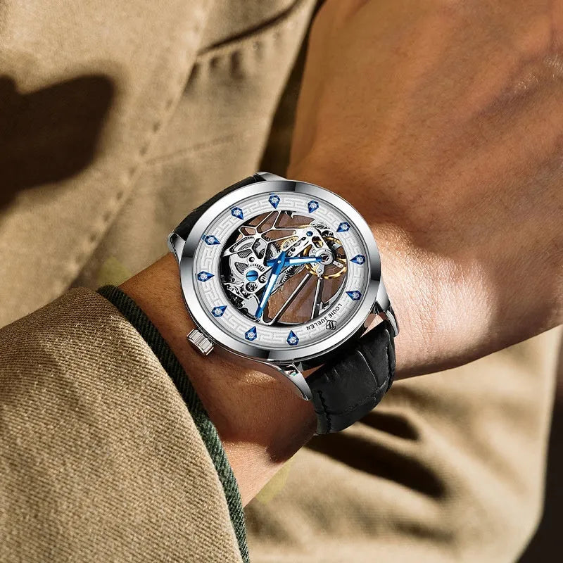 Men's silver case mechanical watch with white dial, blue hands, and black genuine leather strap.