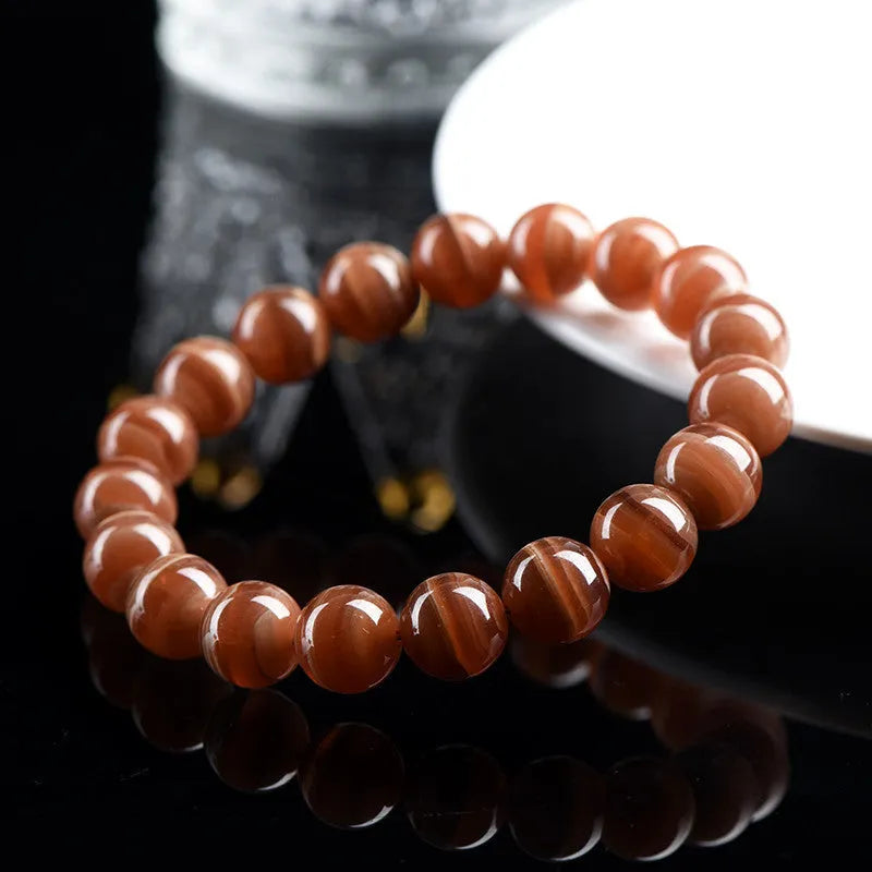 Natural Old Mine Rhodochrosite mineral bracelet with geometric manganese spar beads