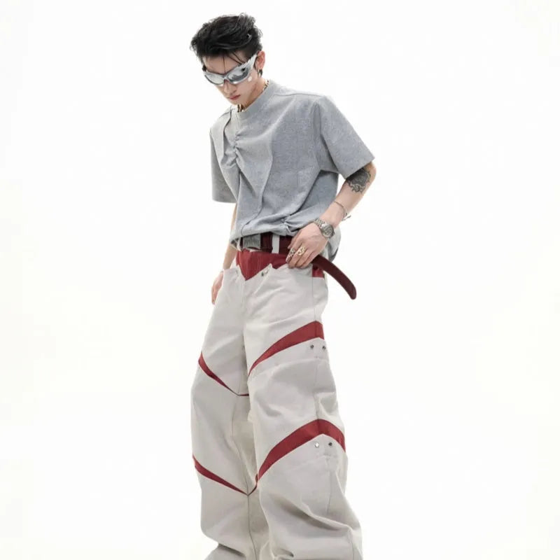 Men's loose fit grey cotton t-shirt with a textured pleated design and round neck.