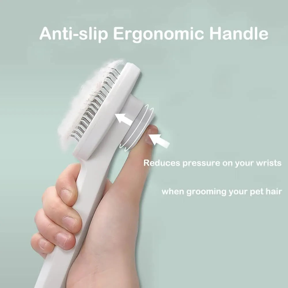 Blue self-cleaning cat grooming brush with rubber-tipped metal pins and ergonomic rubber handle