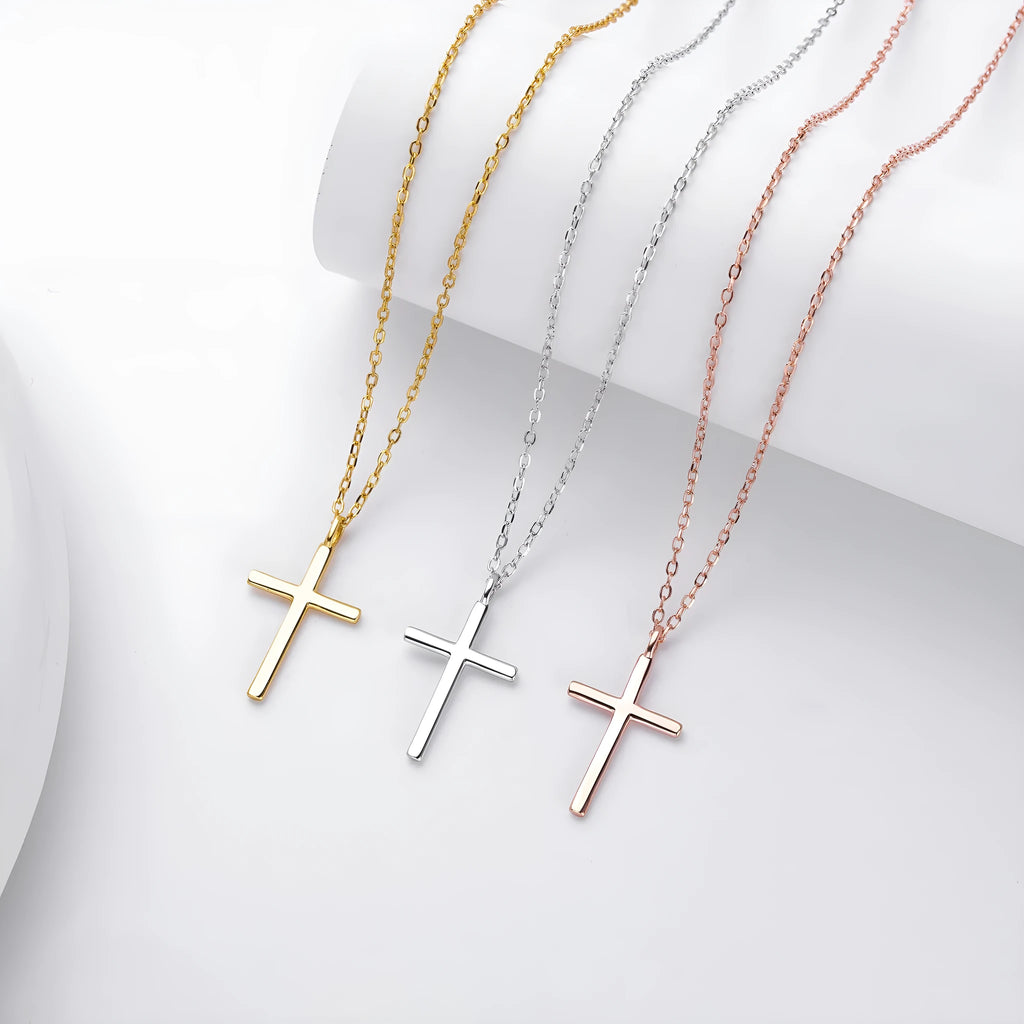 S925 sterling silver necklace with glossy cross pendant on an adjustable O-chain in gold, platinum, or rose gold finish.