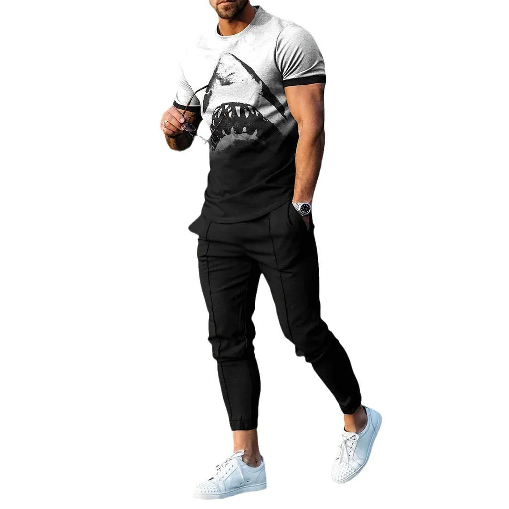 Man wearing a short-sleeved printed pullover and matching trousers from a lightweight polyester casual set.