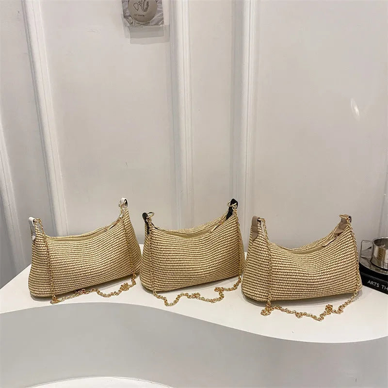 Woven straw crossbody handbag with square shape in khaki colour showing phone pocket