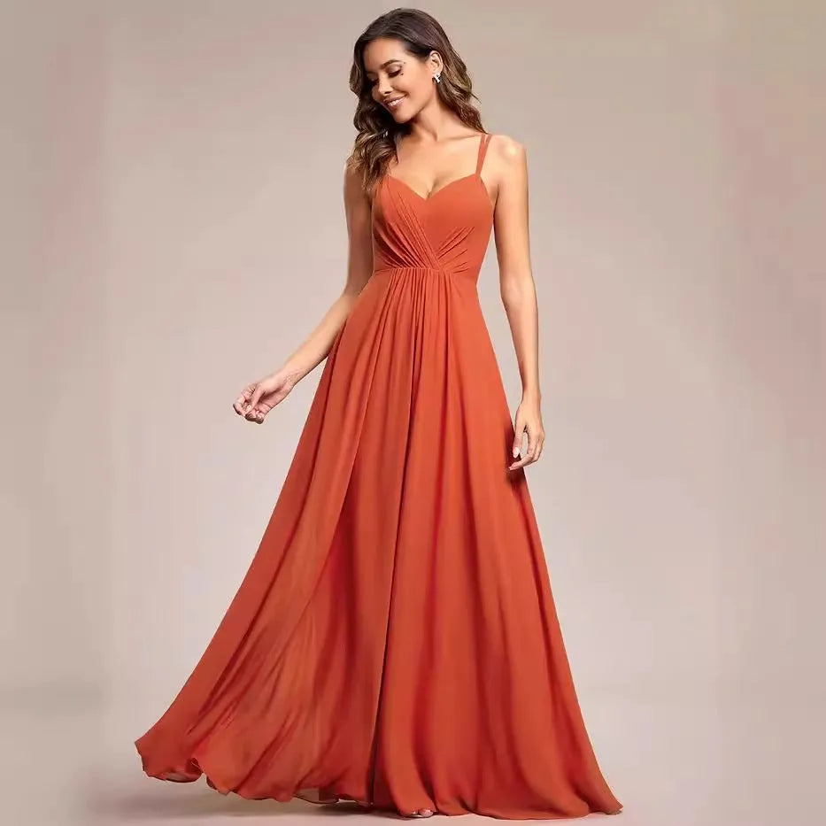 Women's sleeveless long pleated dress in an A-line silhouette, shown in a solid colour.