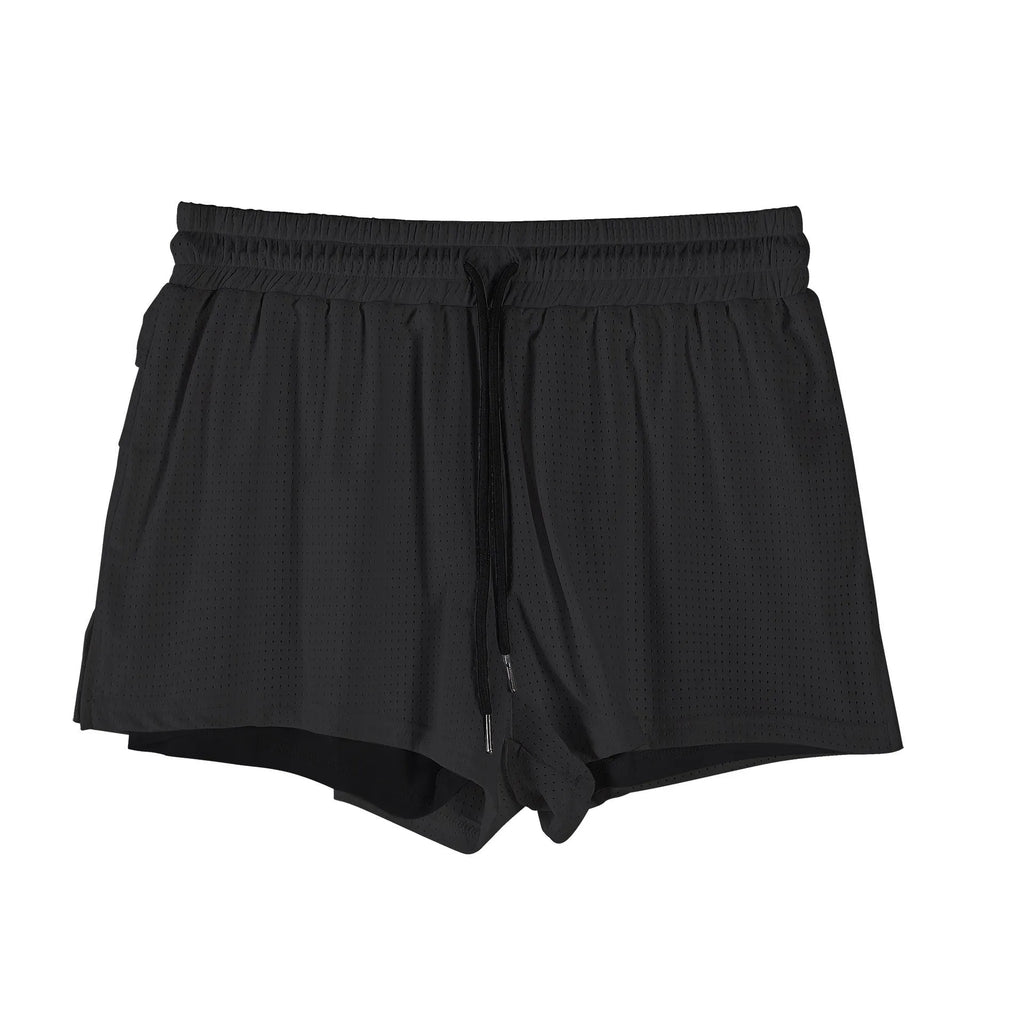Men's black quick-drying nylon sports shorts on a summer background