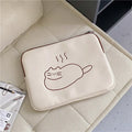 Embroidered fat cat design on a grey nylon laptop protective sleeve with a black zipper.