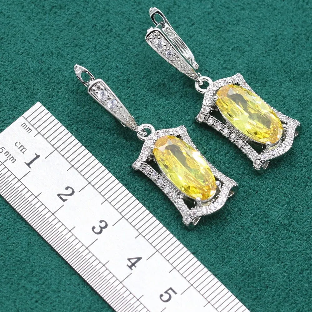 Women's anti-allergy zircon jewellery set with snake bone chain necklace, matching earrings, ring and bracelet in yellow or olive.