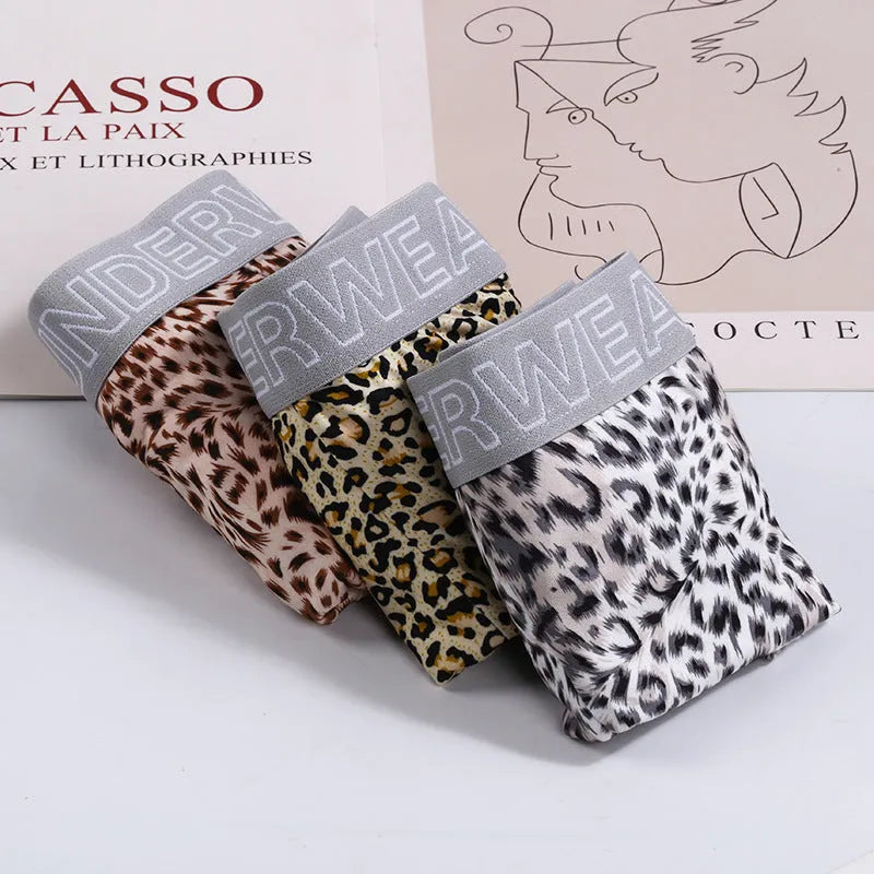 Men's leopard print loose underwear in polyester milk silk fabric showing mid-waist cut