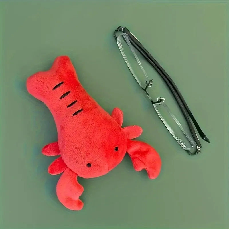 Red lobster-shaped squeaky dog toy for small to medium breeds