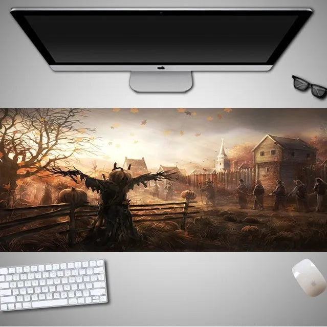Oversized Halloween-themed mouse pad with non-slip rubber base on a desk.