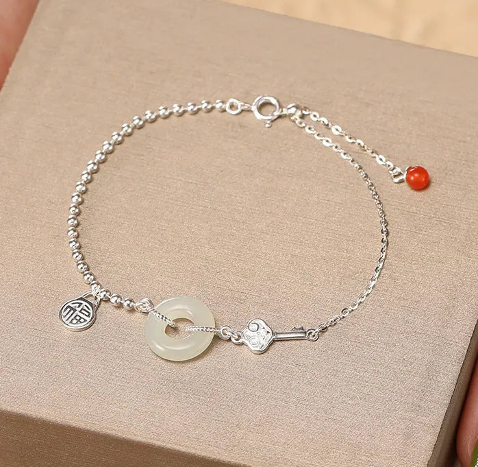 Women's 925 silver Hetian jade bracelet with geometry shape and Ruyi Xiaofu design
