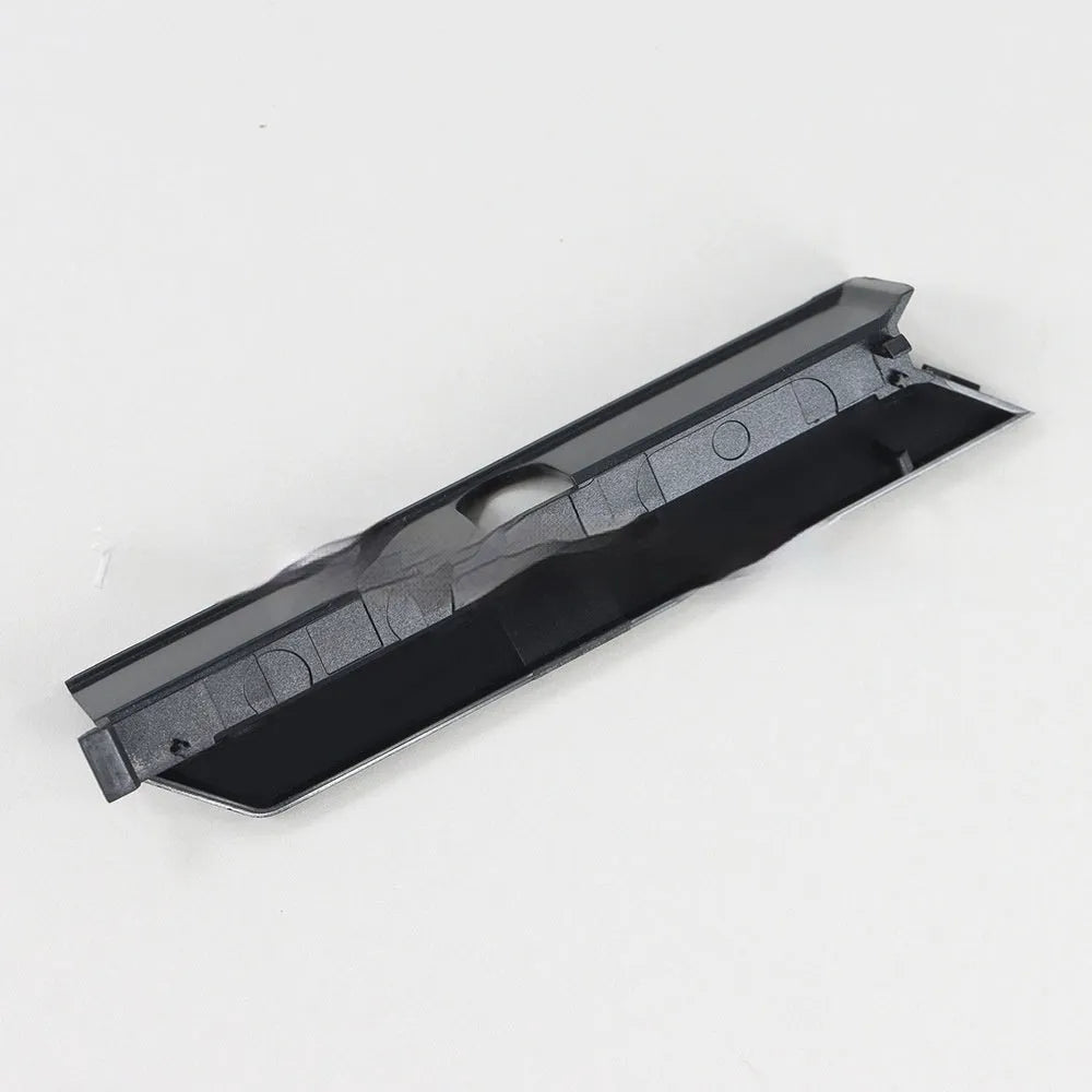 Black plastic hard drive cover for PC case airflow management as baffle bin component