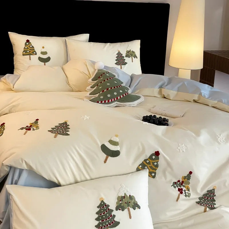 Pure cotton duvet cover and pillowcases with embroidered Christmas tree and floral pattern.