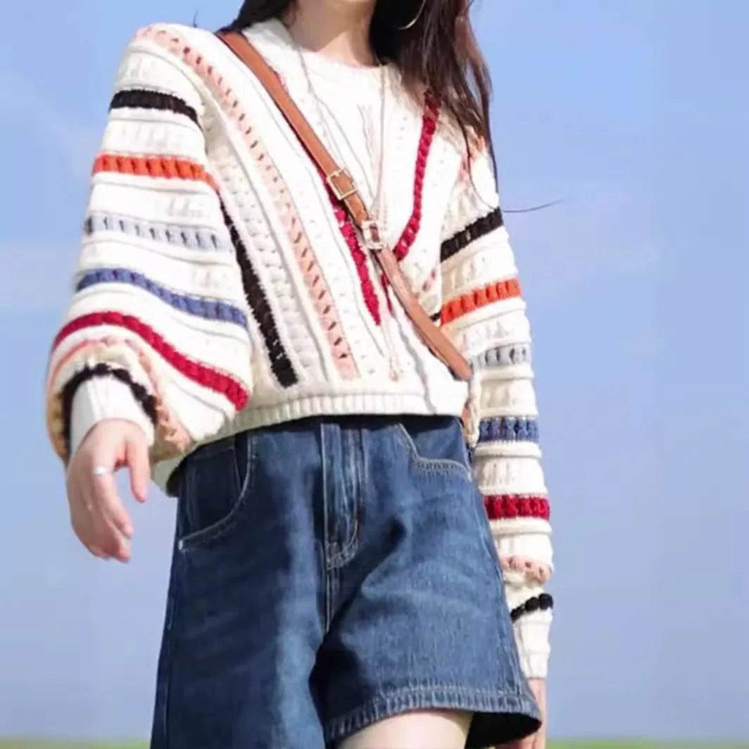 Retro rainbow striped hollow knit sweater with batwing sleeves and round neck in loose fit