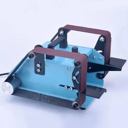 Blue desktop dual-axis belt sander with a 750W motor and variable speed control switch.