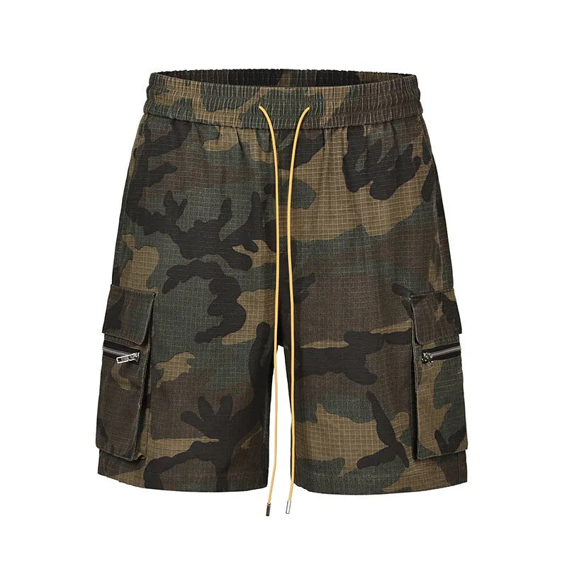 Men's camouflage multi-pocket cropped work shorts laid flat showing cargo pockets and camo pattern.