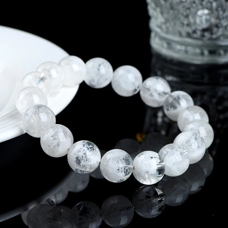 Natural blizzard snowflake crystal bracelet with round geometric beads and traditional Chinese elements