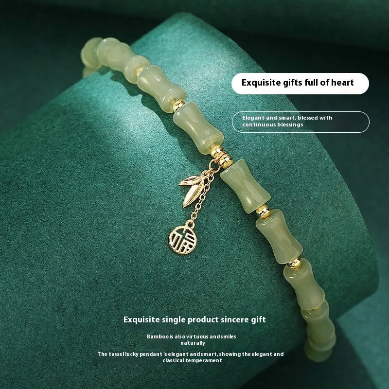 Green Chinese bamboo style jade bracelet and necklace set with traditional design