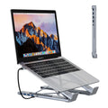 Aluminium folding laptop docking station showing 8-in-1 ports and raised stand.