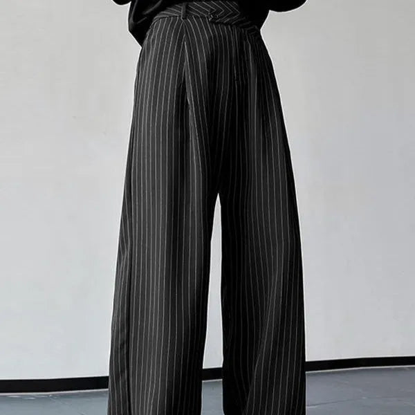 Men's black vertical striped pleated casual trousers showing front design and fabric texture