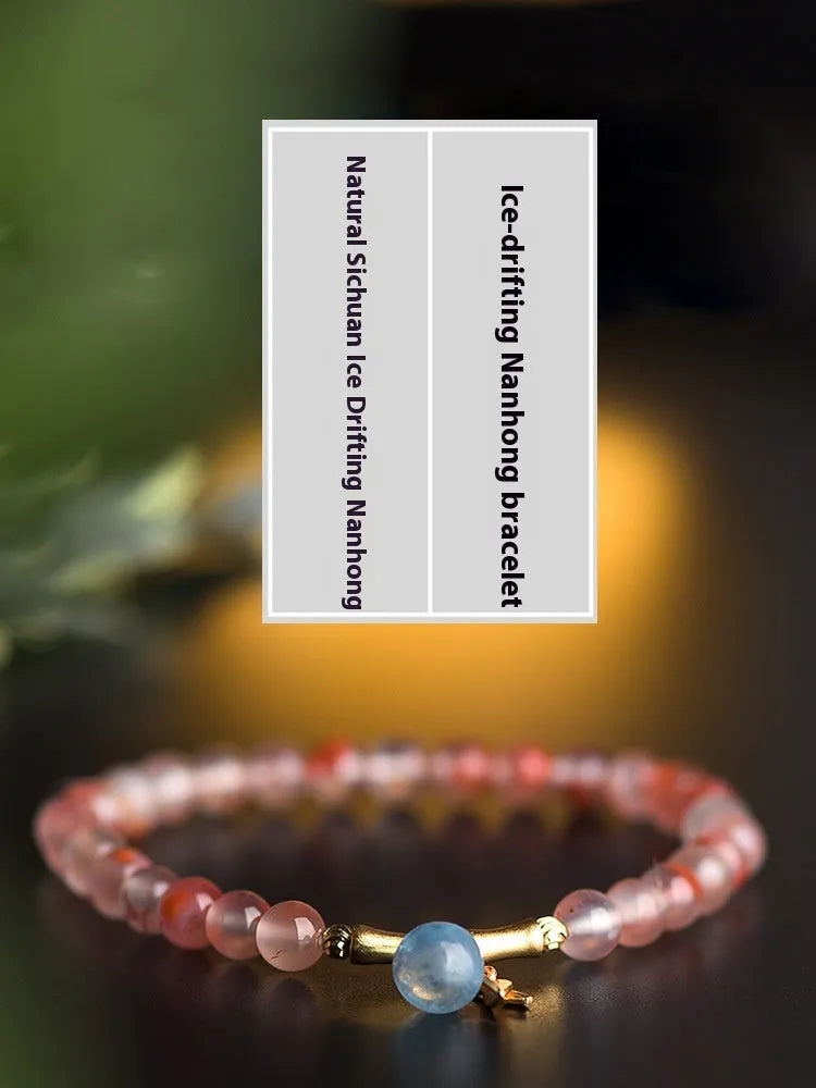 Agate ethnic bracelet with flower shape and bamboo joint design in Hetian Jade colour.