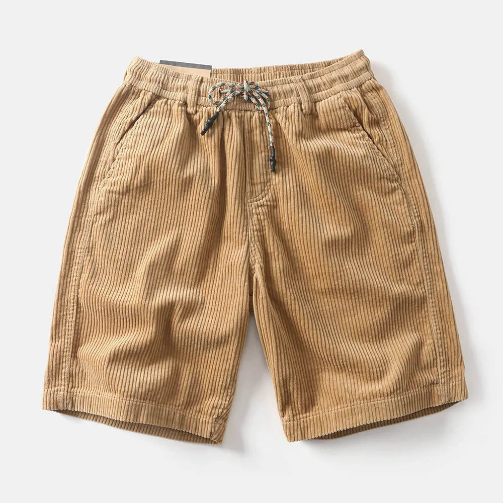 Man wearing khaki retro-style American cargo shorts made from polyester fabric.