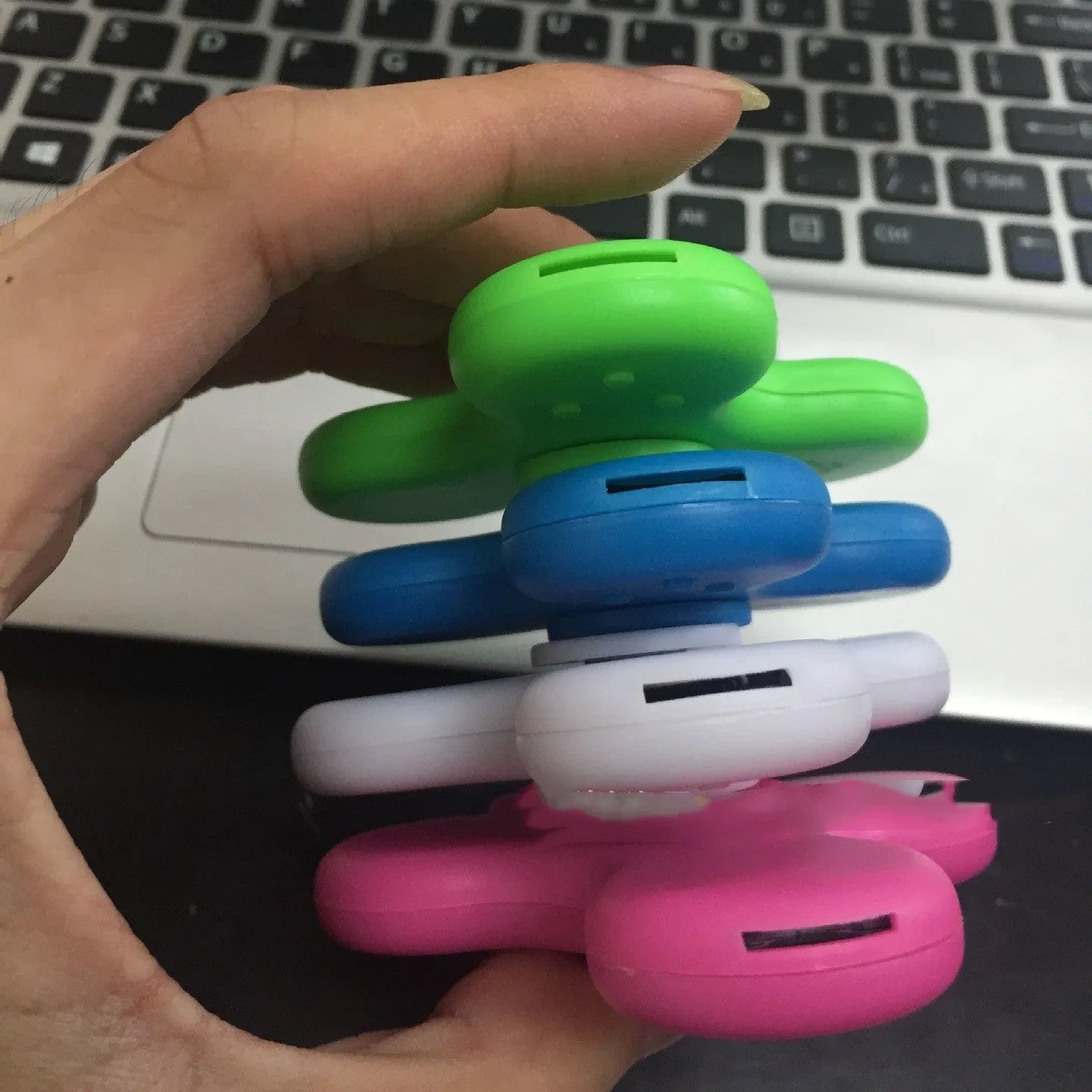 Blue Bluetooth speaker music fidget spinner MP3 player with TF card slot measuring 80mm diameter