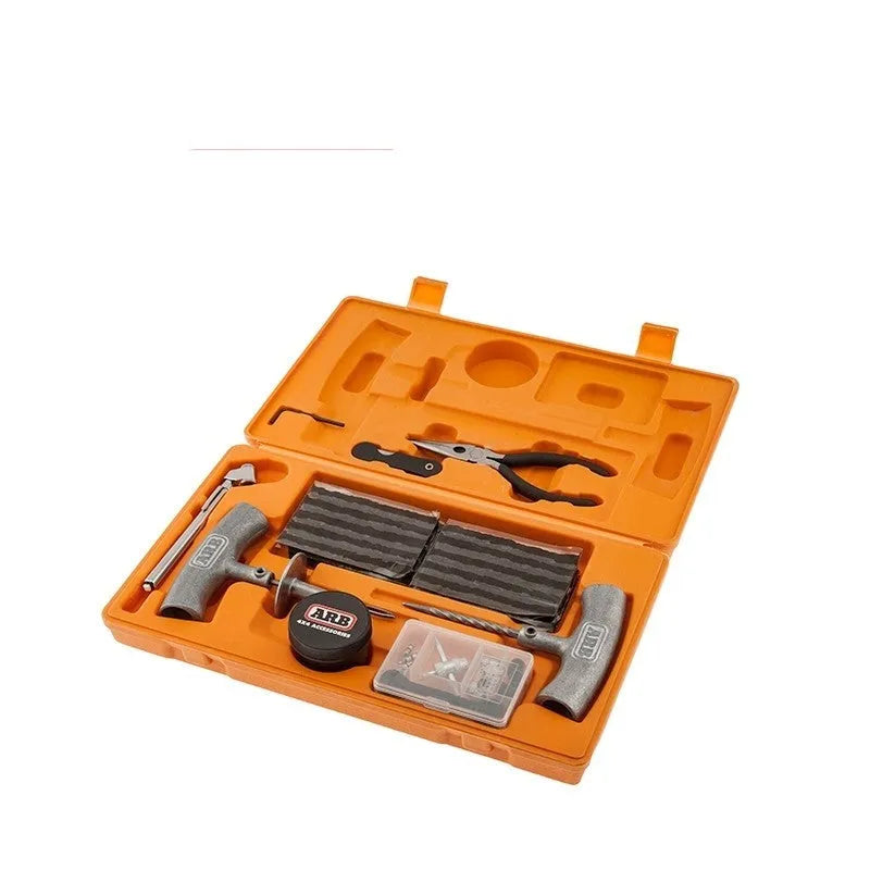 Speedy Seal emergency car tyre repair tool kit with rubber strip plugs, gauge, and tools in a yellow case.