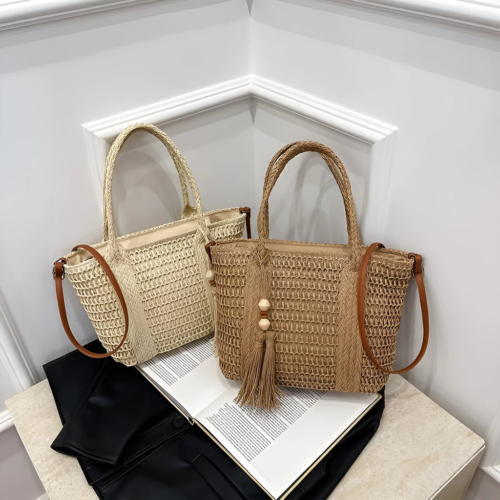 Large straw crossbody bag with woven raffia construction and polyester lining