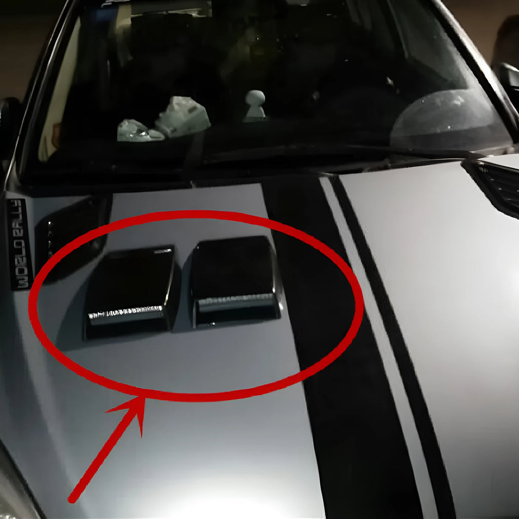 Black, white, and silver ABS plastic car decoration simulation air vent with tapered design.