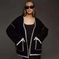 White lace-up knitted cardigan sweater coat with long sleeves and mid-length design