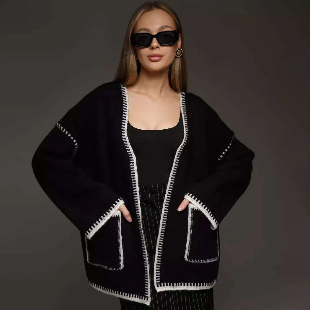 White lace-up knitted cardigan sweater coat with long sleeves and mid-length design