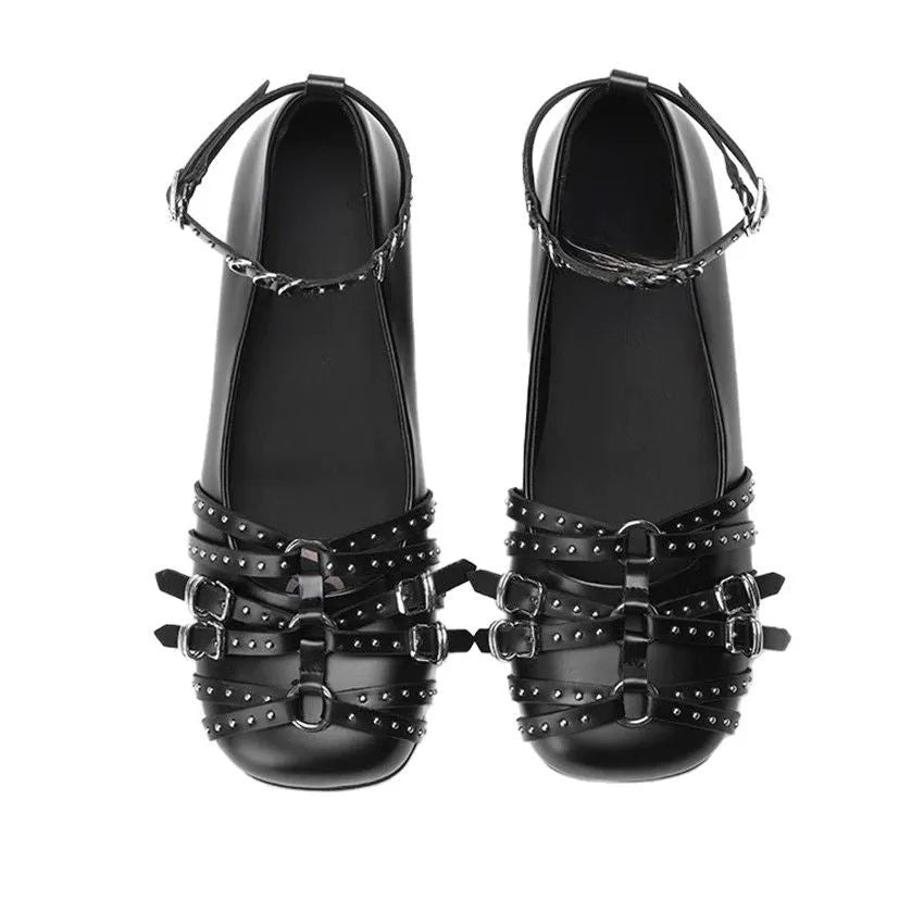 Women's black genuine leather retro pumps with buckle and low flat heel.