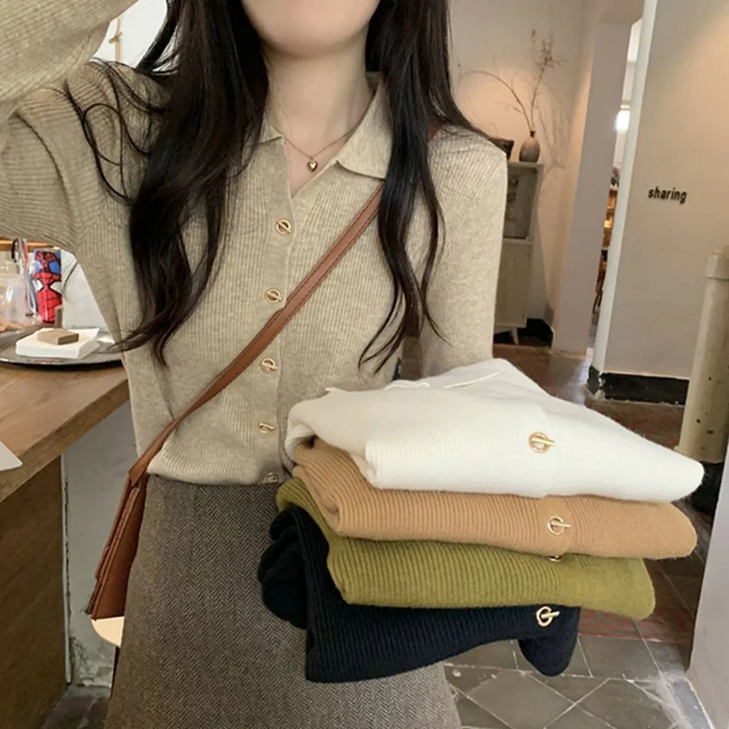 Long sleeve knitted cardigan in viscose fibre showing loose fit and available in beige, black, oatmeal, green, and khaki colours