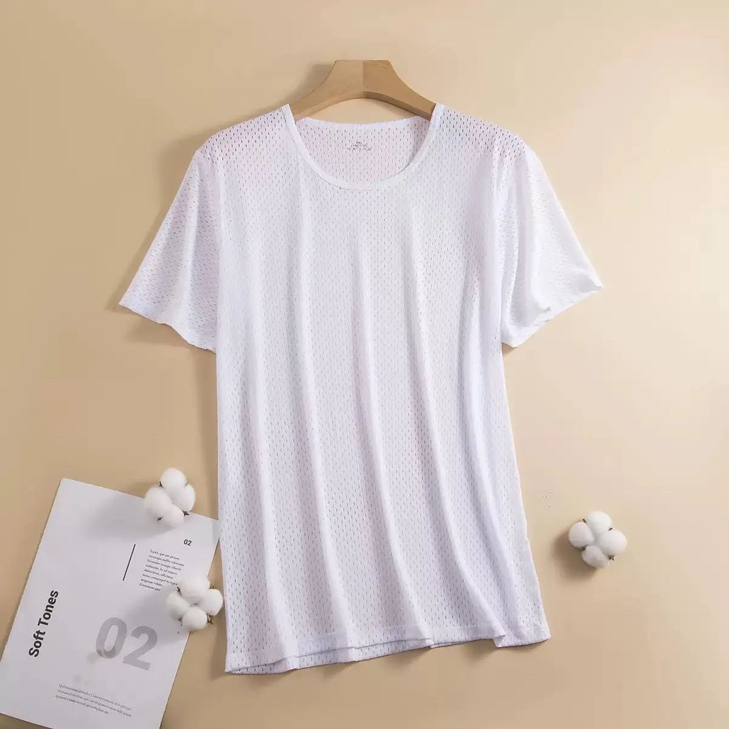 Man wearing a grey ice silk mesh short sleeve crew neck t-shirt with a loose fit.