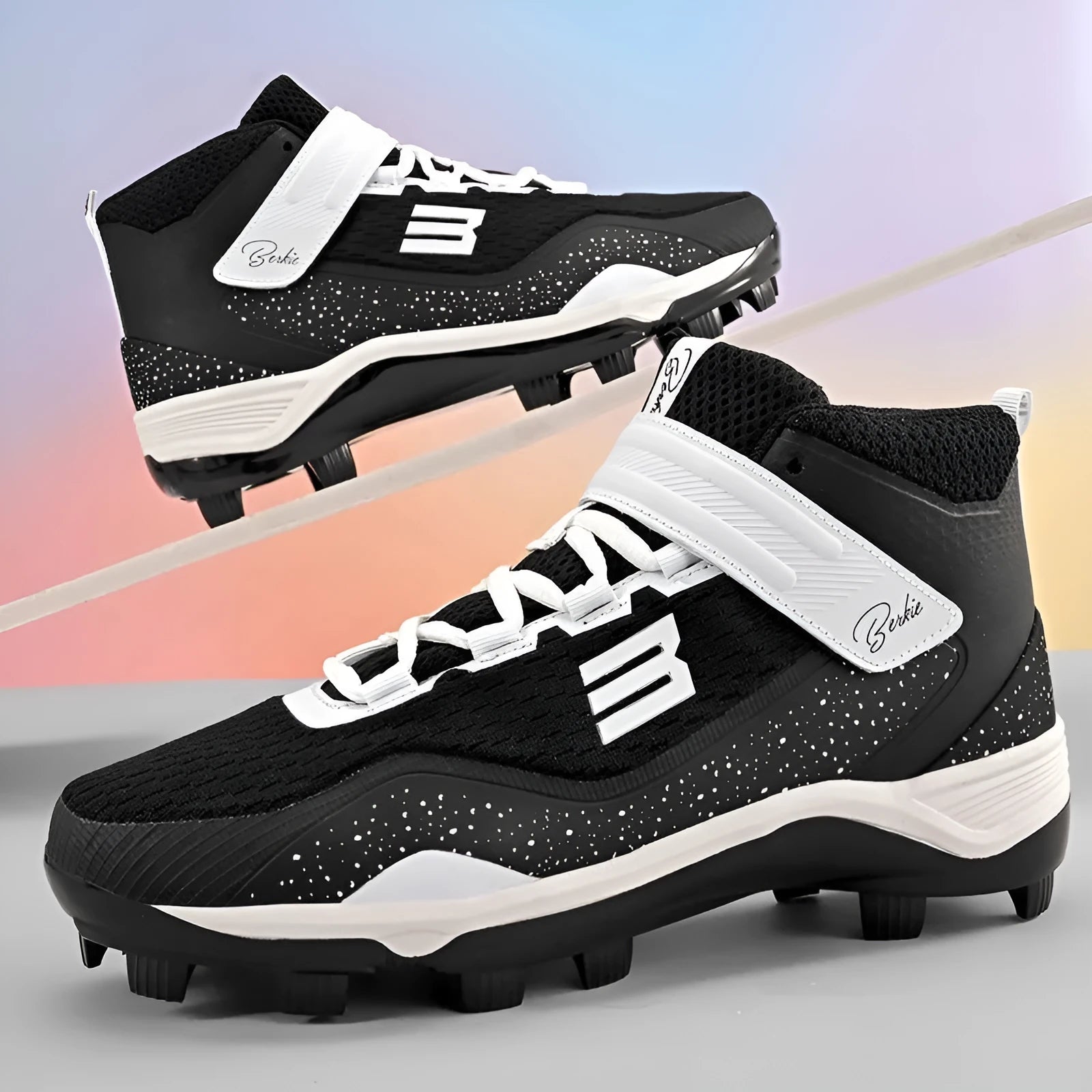 Black and white mid-top sports sneakers with velcro straps and a rubber sole.