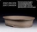 Handmade purple sand clay oval bonsai flower pot showing antique shape and 25x21x6.3cm dimensions