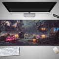 Oversized Halloween-themed mouse pad with non-slip rubber base on a desk.