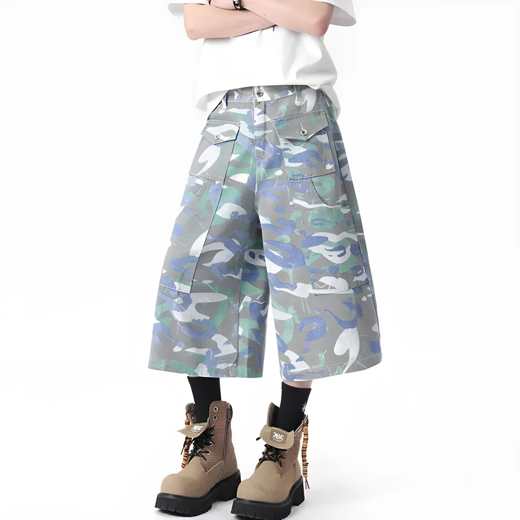 Camouflage pattern cotton cropped cargo trousers on a hanger, showing straight leg and pocket detail.