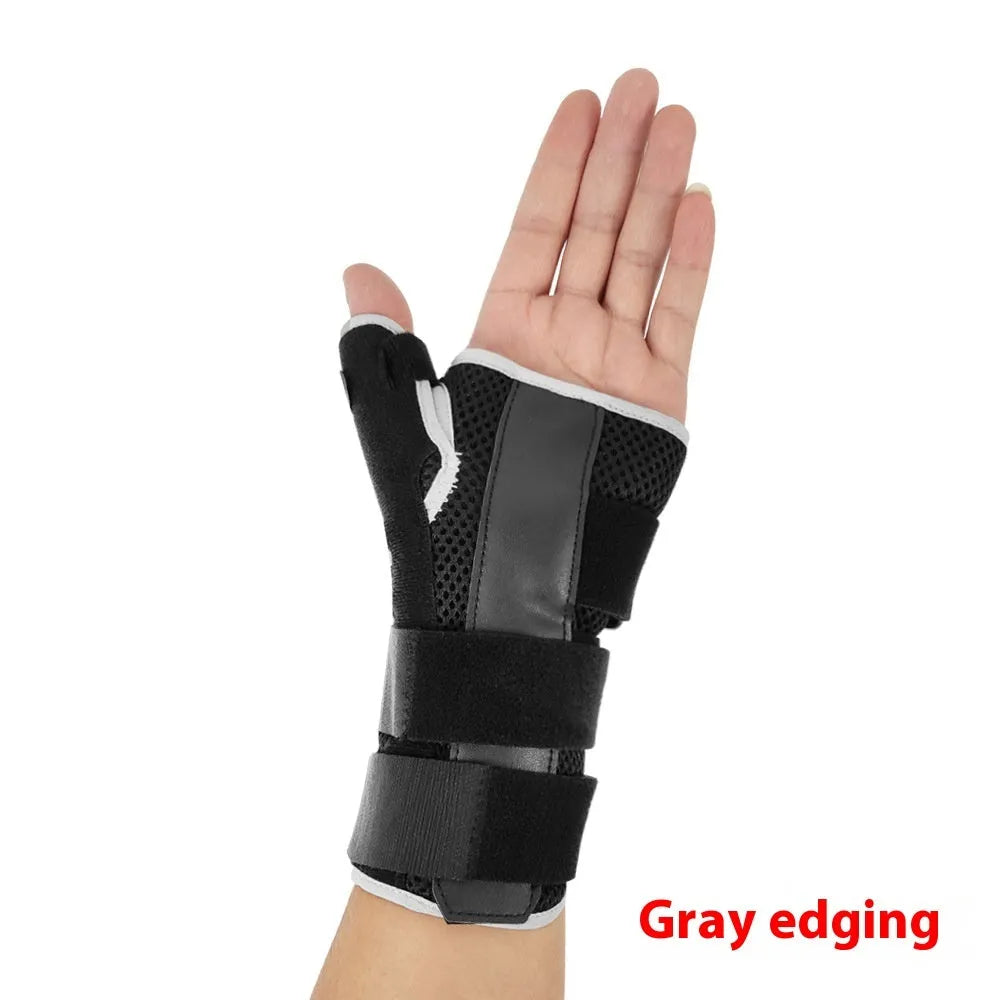 Black carbon fiber sports wrist guard with grey edging and an adjustable thumb strap.